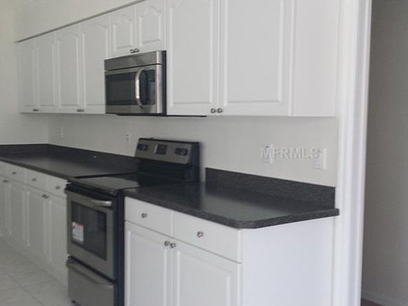 5th image of 3887 Crescent Cove Pl