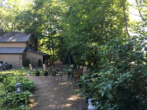 Patio, fire pit, hot tub.