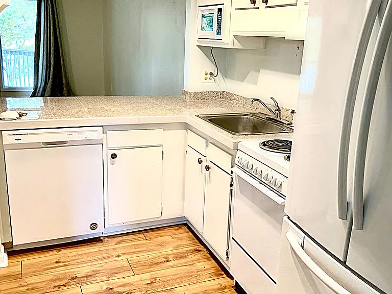 6112 Harbourside Dr — Photo 2