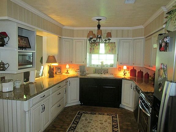 UPDATED KITCHEN WITH NEW GRANITE COUNTERS, NEW CABINETS, 5 BURNER GAS STOVE AND MORE