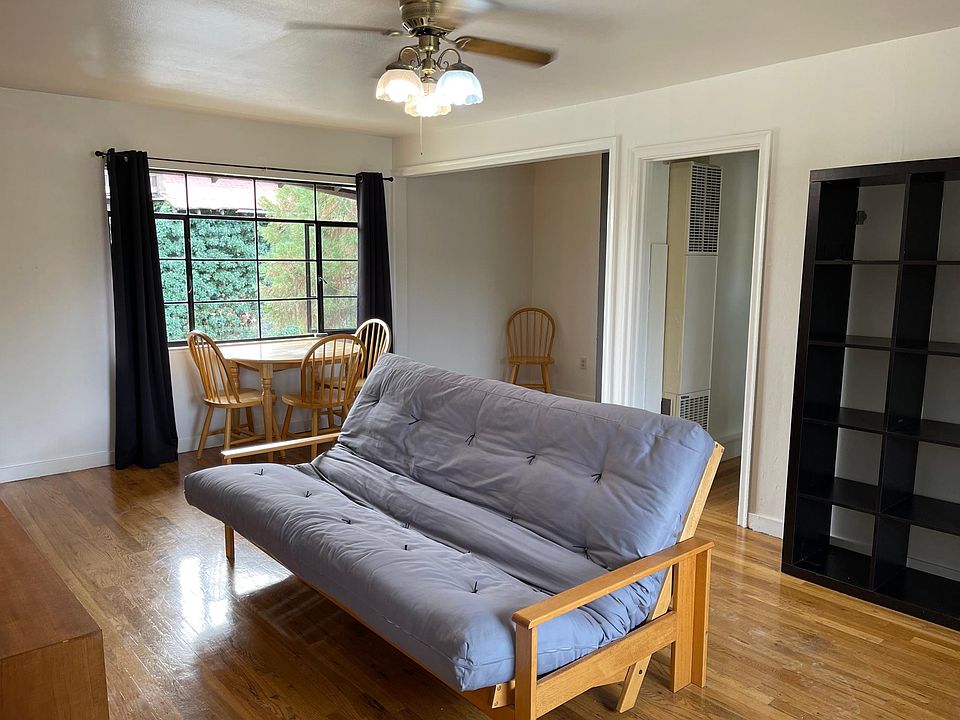 furnished living room, black out curtains in living room and bedroom