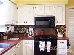 Kitchen w/ gas stove & built in microwave