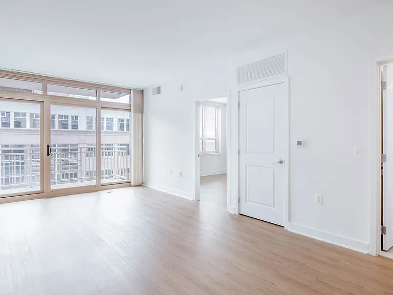 Living Room with Balcony and Hard Surface Flooring