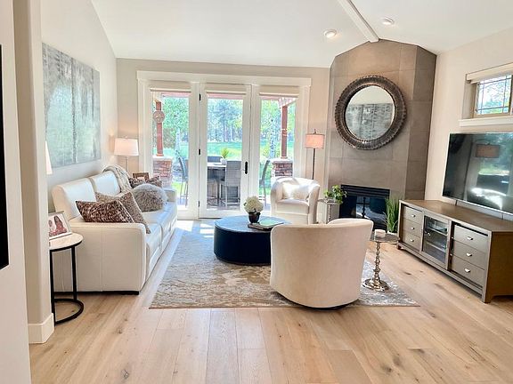 Living room overlooking the 18th fairway of Brokentop Country Club golf course