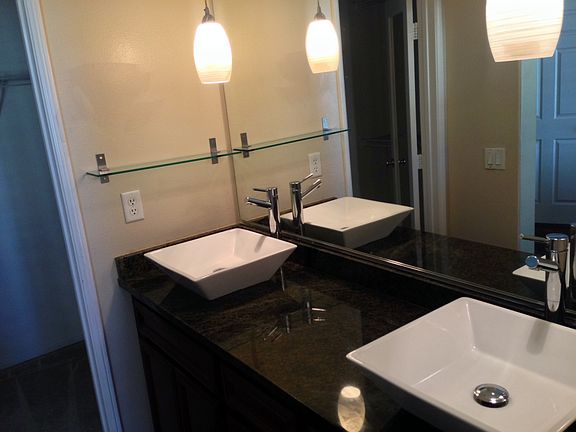 Upgraded granite his and her sinks in upstairs master bedroo