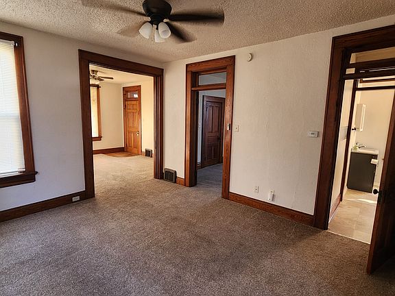 Spacious Living Area with New Carpet