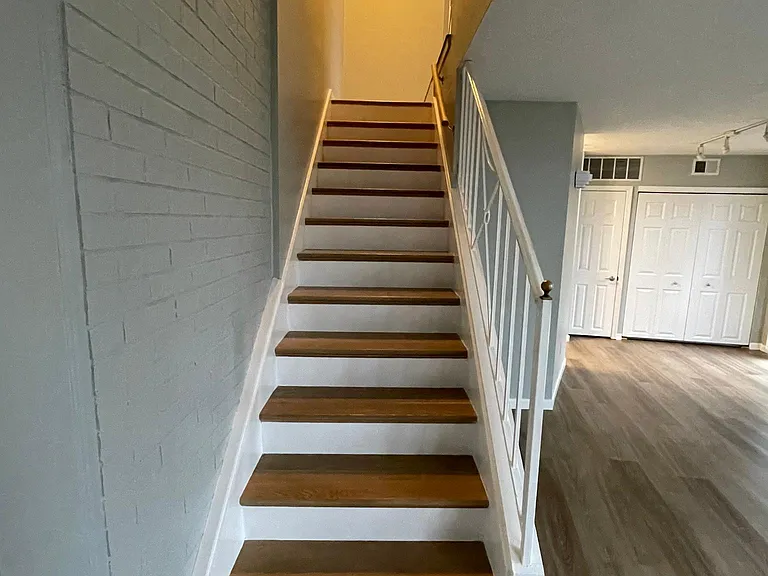 Stairway to bedrooms and bath.