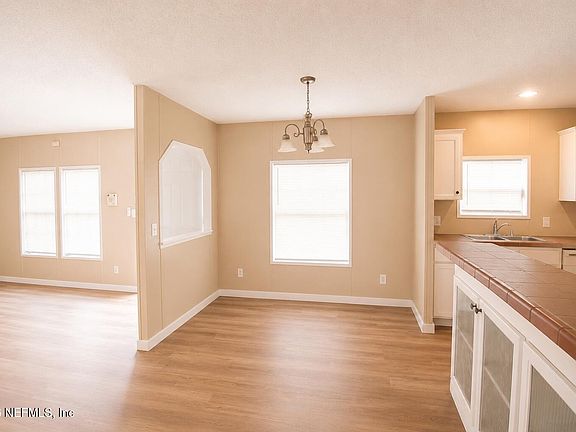 2nd image of 130 W LOUIS BROER Road