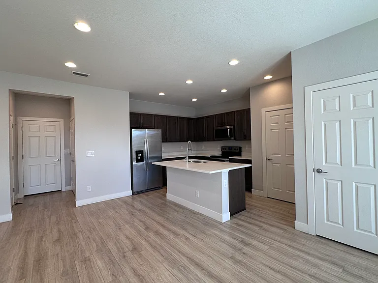 Open Space easily connects kitchen with living area.