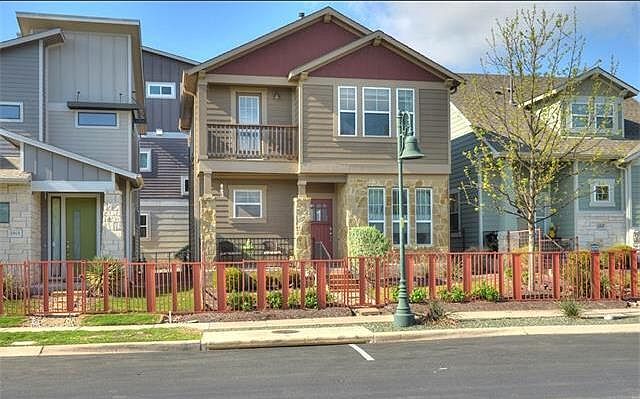 Gated front yard with doggy door