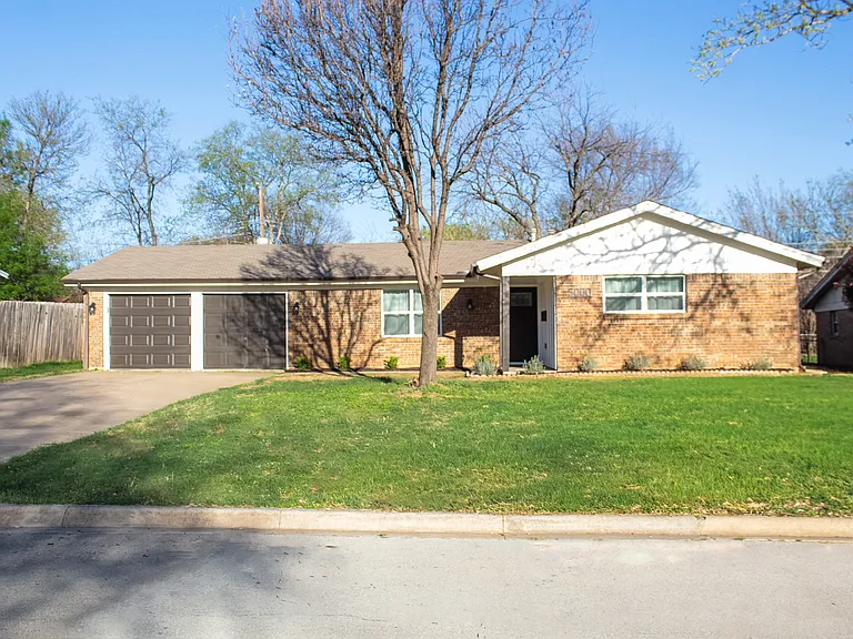 Two car garage with washer and dryer included