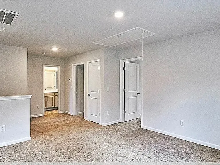 Mini Living Room with entrance to other rooms