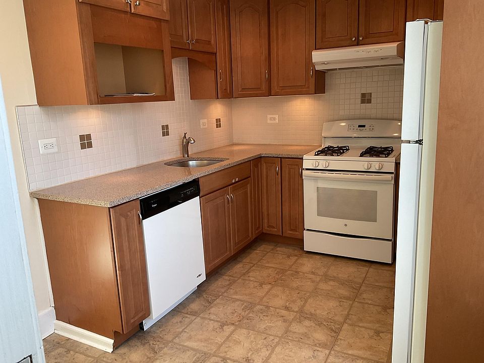Kitchen with quartz countertop and plenty of outlets