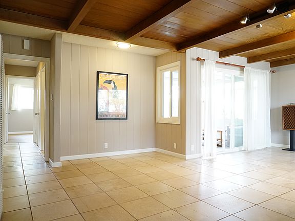 Open dining area connected to living room.