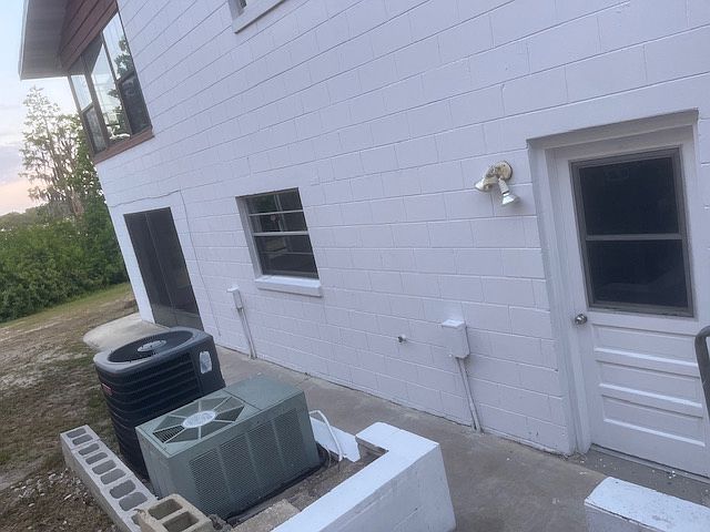 Outside photo that shows doorway into unit.
