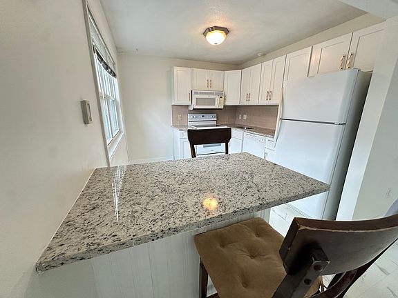 Island with granite counter top