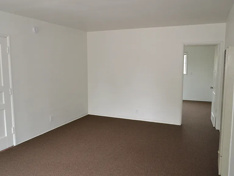 Living Room to front door and bedroom