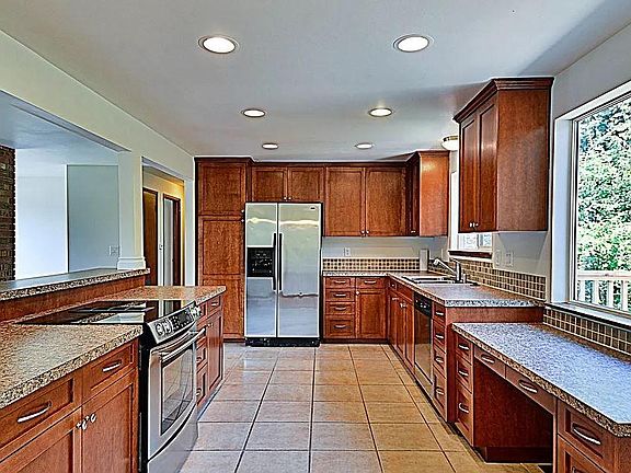 Spacious, bright kitchen. Open floor plan.
