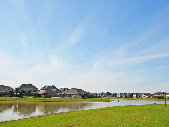 Beautiful lake view as you take a stroll or bike ride through this amazing subdivision!