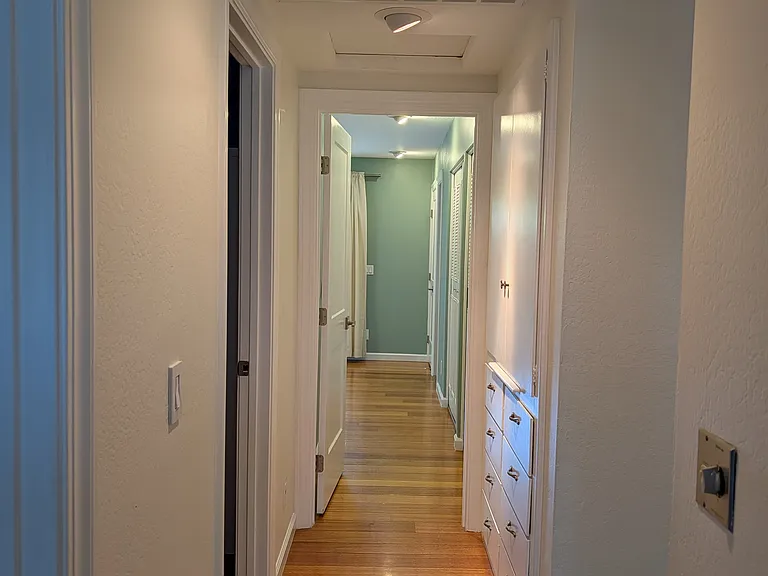 Hallway bedroom, facing master bedroom and hallway.