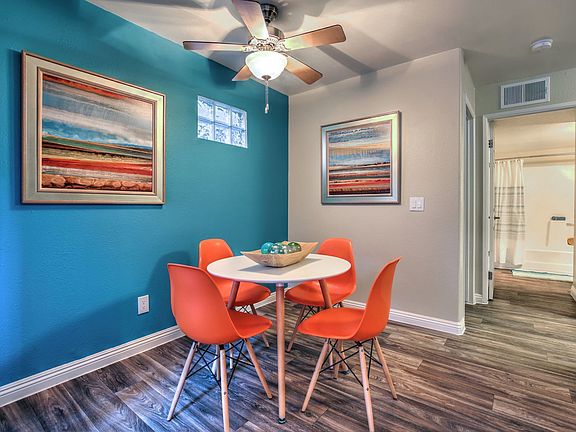 Dining room with ceiling fans in select homes