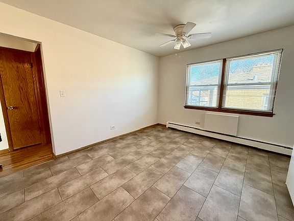 Eating area in kitchen. Room for a good sized table and chairs.