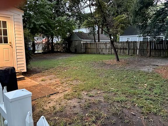 Fenced back yard. Common fence in back belongs to neighbors as far as fixing/mending.