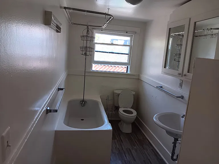 Bathroom with large tub and toilet