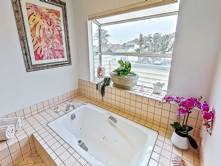 Primary Bathroom Upstairs with soaking tub and separate large stall shower.