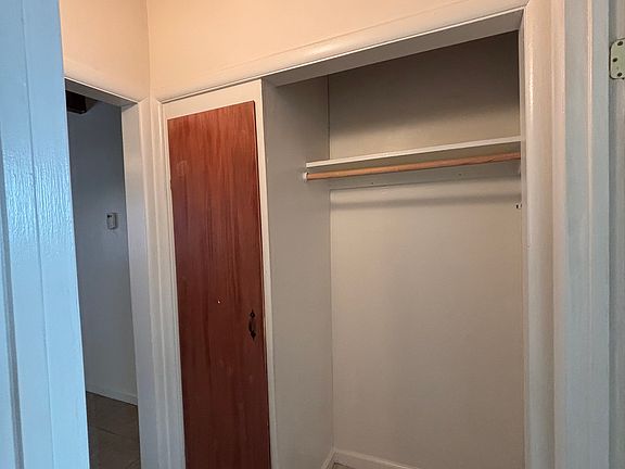 Additional closet space in hallway! Hallway separates living area and kitchen from bedroom and bath--great layout