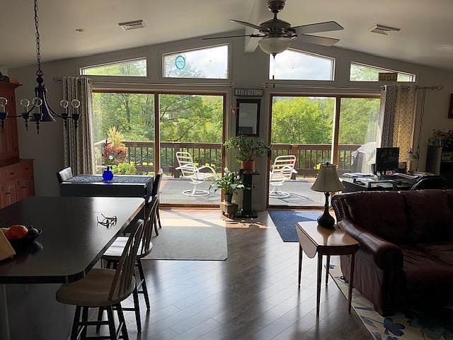 Like living in a vacation home year-round! South-facing windows and doors add warming passive-solar benefits in winter.