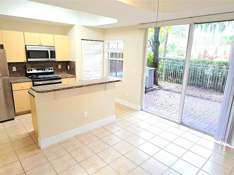 4950 Tradewinds Ter #505 — Photo 12
