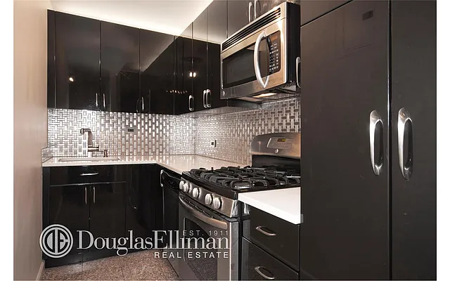 Sold by Douglas Elliman | media 13