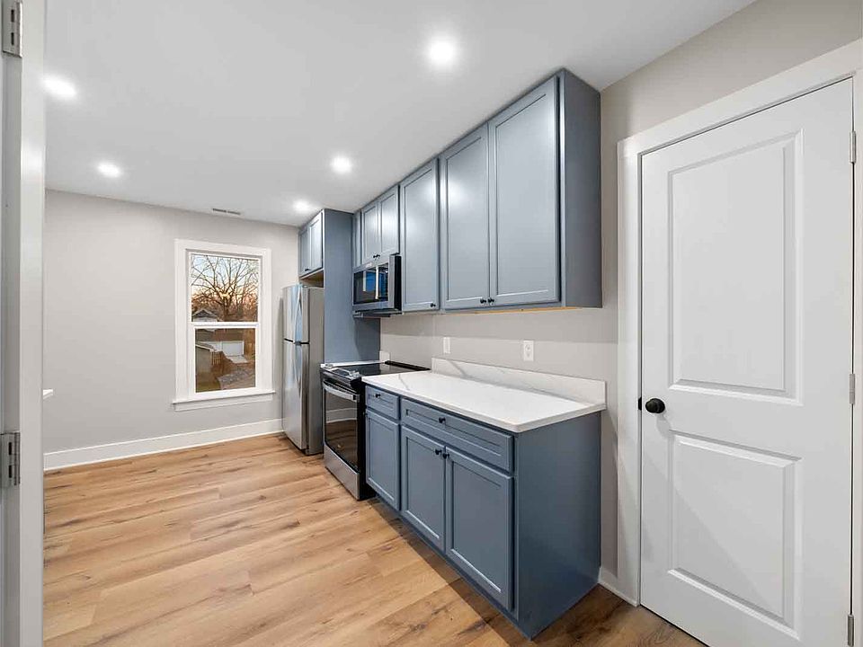 Kitchen with pantry and in-unit laundry