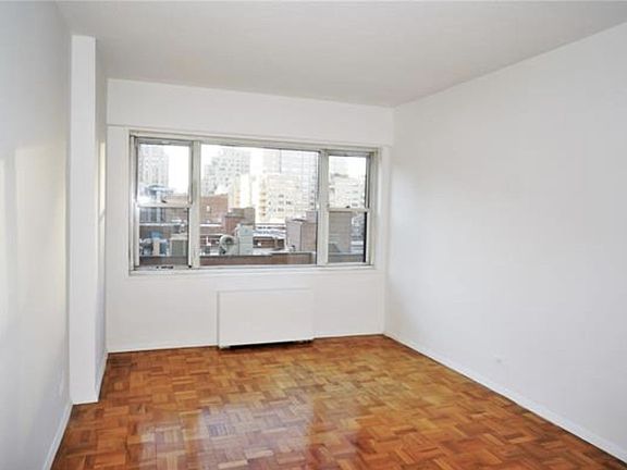 4th image of 60 E 8th St APT 7C