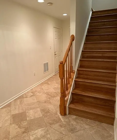 Ground level entry to basement and garage