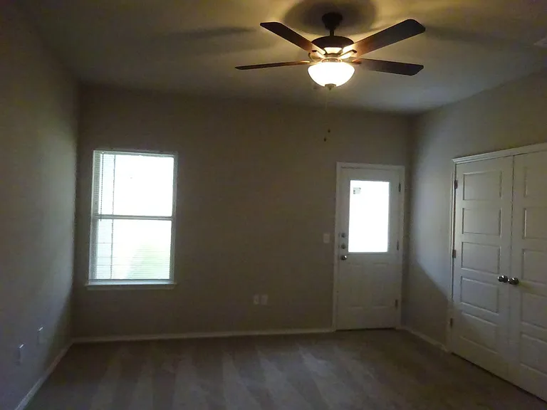 Primary bedroom, easily fit a king bed. Walkout to private porch facing backyard. Ensuite bathroom connected to primary bedroom