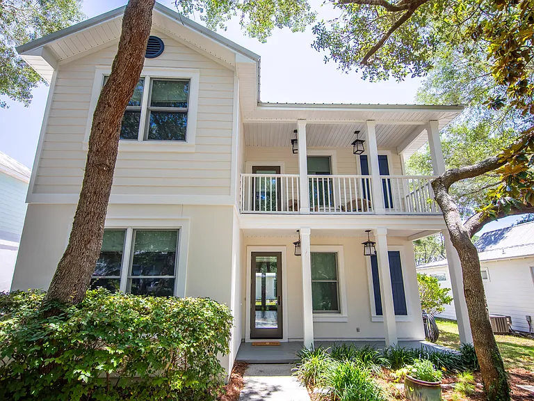 Bright and airy home with lots of windows and two porches for outdoor enjoyment.