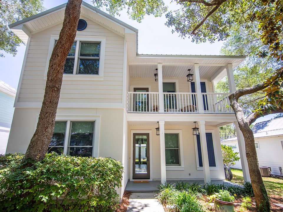 Bright and airy home with lots of windows and two porches for outdoor enjoyment.