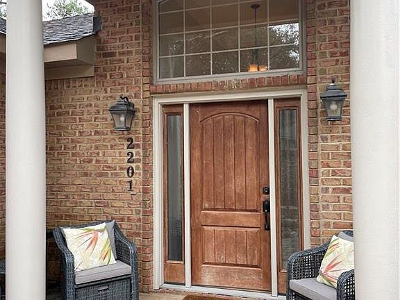 Front portico perfect for relaxing under.