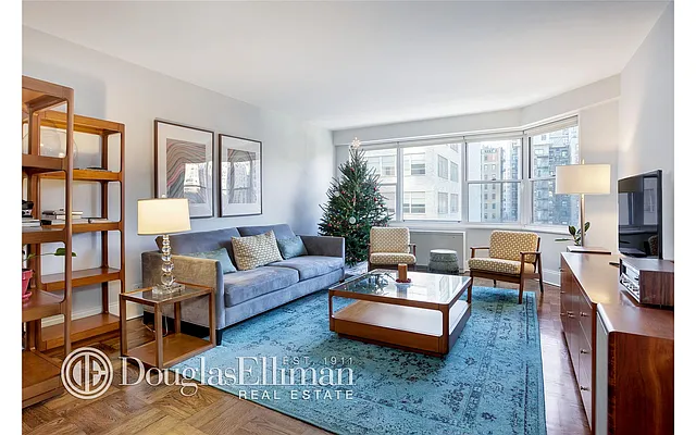 Sold by Douglas Elliman | media 18