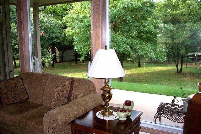 large picture window view to backyard