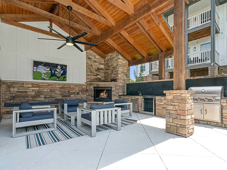 Pool-side lounge with wet bar and gas grill