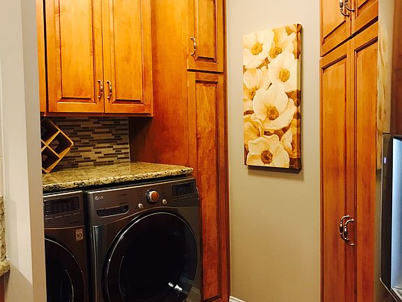 Laundry area with pantry