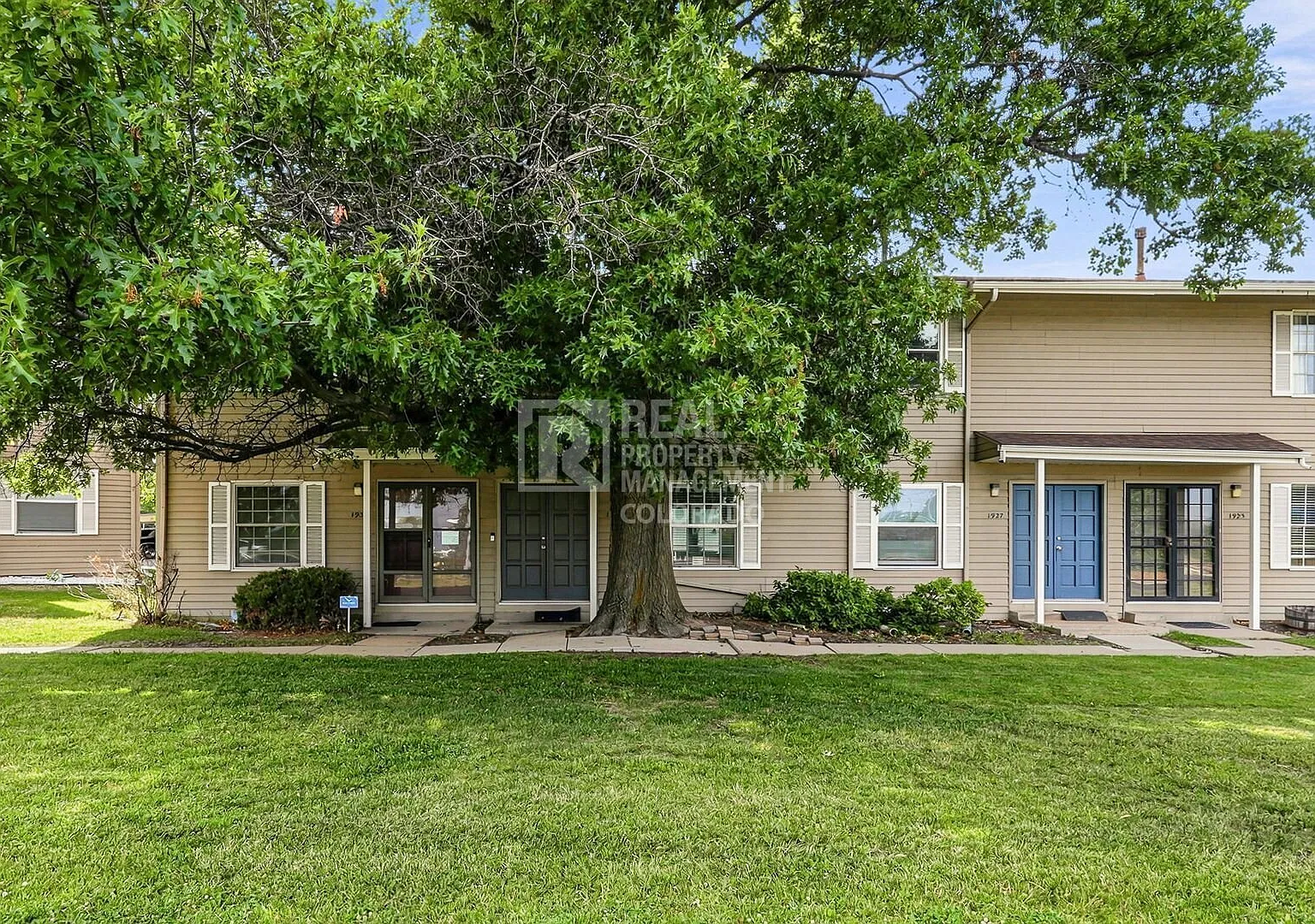 Updated 2-Bedroom Townhome with Finished Basement & Community Pool — Photo 1