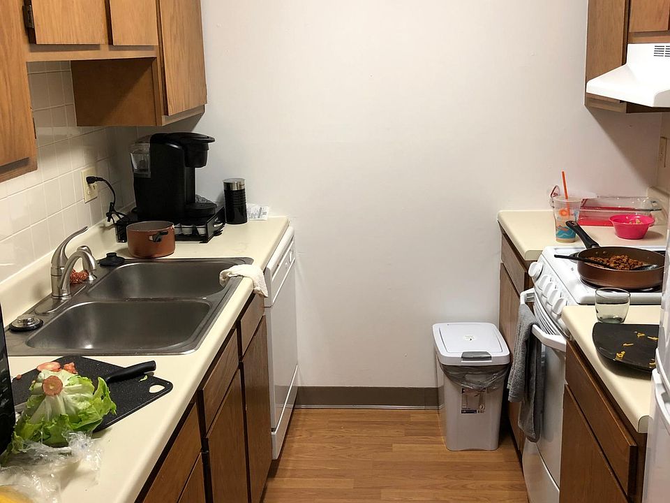 The galley kitchen includes a dishwasher
