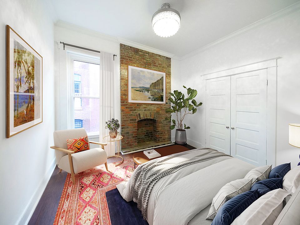 Second floor home, front bedroom staged.