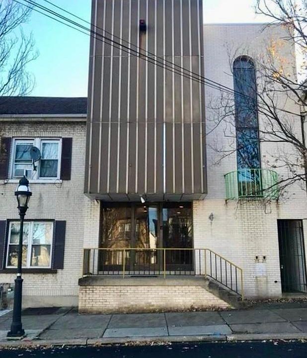 Building exterior, entrance on the right.