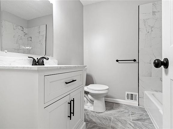 5th image of 8002 E 130th Ct
