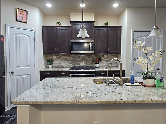 Kitchen

Left Side Door - Kitchen Pantry
Right Side Door - Extra Space Under Stairs (Can be used as Pantry-2 or Extra Storage)